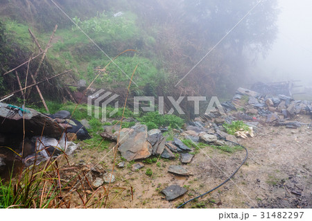 wet tent in rainforest on hill in Tiantouzhai wet tent in rainforest on hill in Tiantouzhai 31482297