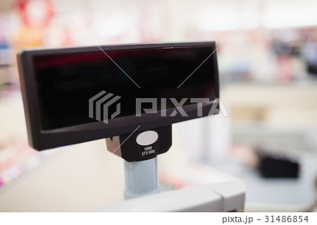 Focus on foreground of the cash register screen 31486854