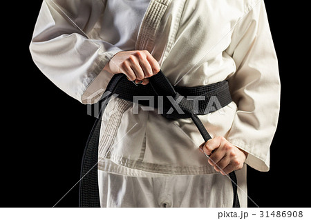 Fighter tightening karate belt Fighter tightening karate belt 31486908
