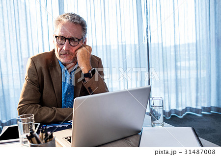 Businessman at office Businessman at office 31487008