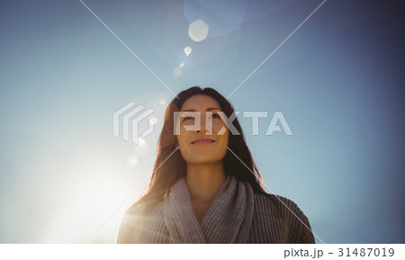 Woman standing at beach 31487019