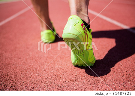 Athletes feet running on the racing track Athletes feet running on the racing track 31487325
