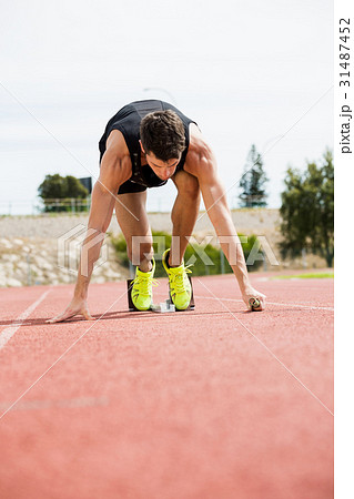 Athlete ready to start the relay race 31487452