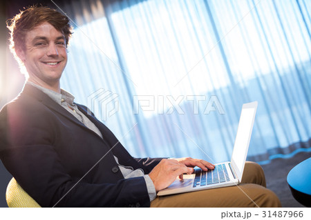 Young businessman smiling Young businessman smiling 31487966