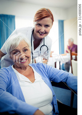 Portrait of nurse with a senior woman 31488066