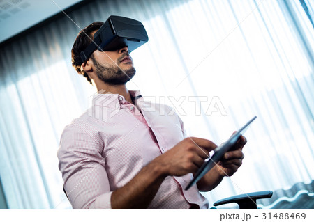 Businessman using an oculus 31488469