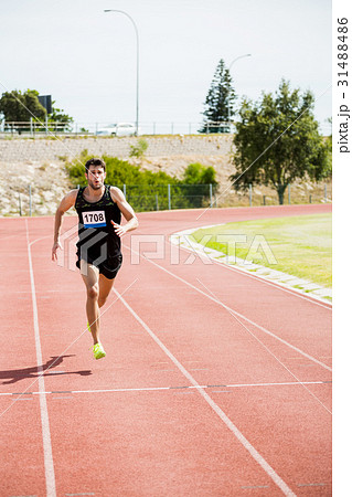 Athlete running on the racing track 31488486