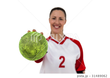 Sportswoman holding a ball Sportswoman holding a ball 31489062