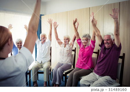 Seniors doing exercises 31489160