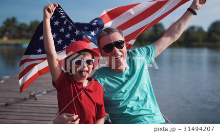 Father with son on lake 31494207