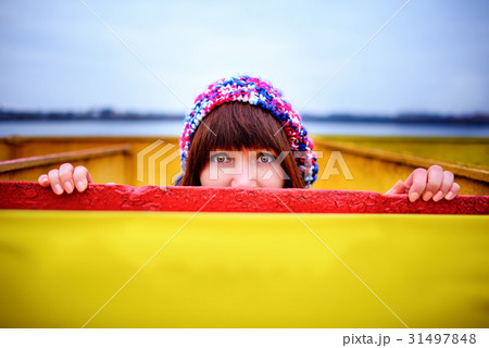 young woman holding a yellow board young woman holding a yellow board 31497848