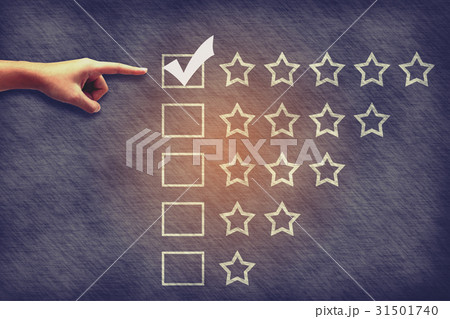 Hand man pointing to excellence box on blackboard. 31501740