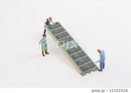 Miniature engineers with  circuit board. Miniature engineers with  circuit board. 31502028