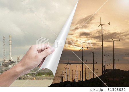 hand opening page oil industry to wind turbines. 31503022