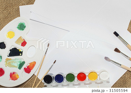 Set of watercolor paints, brushes for painting and 31505594