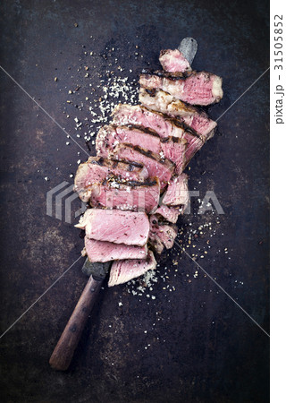Barbecue Entrecote Steak sliced on old Metal Sheet 31505852