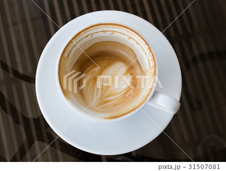 hot coffee latte in a white cup 31507081