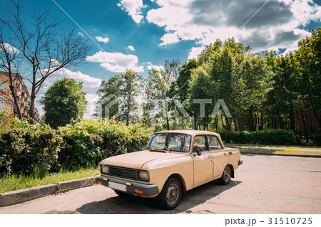 Russian Old Car Parking On Village Street In Sunny 31510725