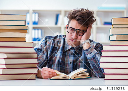 Nerd funny student preparing for university exams Nerd funny student preparing for university exams 31519238