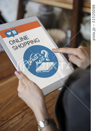 Hands working on digital device network graphic overlay Hands working on digital device network graphic overlay 31520086