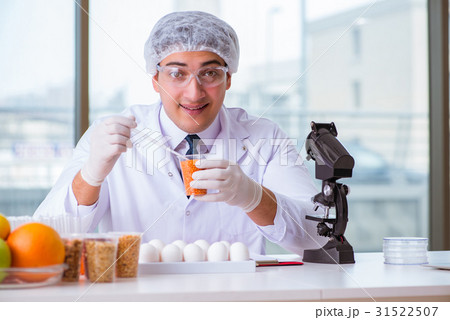 Nutrition expert testing food products in lab Nutrition expert testing food products in lab 31522507