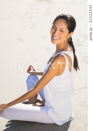 Portrait of beautiful woman performing yoga Portrait of beautiful woman performing yoga 31522541
