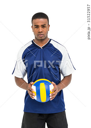 Sportsman holding a volleyball 31522957