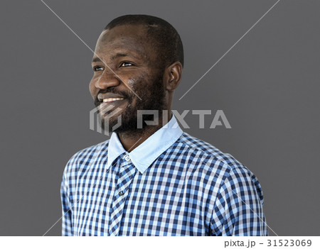 African man mustache smiling studio portrait 31523069