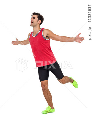 Athlete man posing after victory 31523657