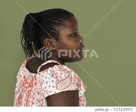 Little african girl casual studio portrait side view Little african girl casual studio portrait side view 31523955