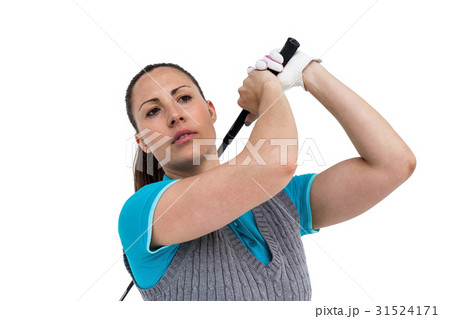 Golf player taking a shot Golf player taking a shot 31524171