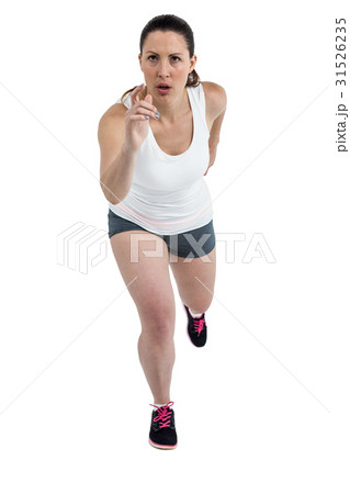Energetic female athlete running Energetic female athlete running 31526235