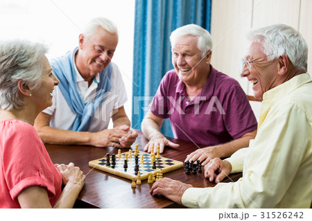 Seniors playing chess Seniors playing chess 31526242