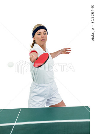 Female athlete playing table tennis 31526446