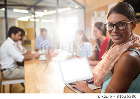Hipster businesswoman using a smartphone Hipster businesswoman using a smartphone 31526580