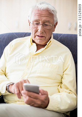 Senior using a smartphone 31526809