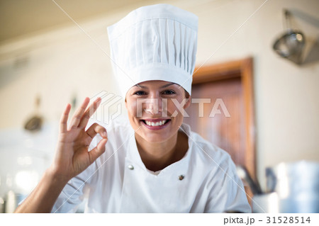 Portrait of happy chef making ok sign 31528514