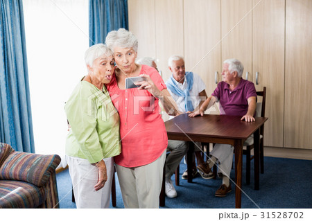 Senior women taking a selfie Senior women taking a selfie 31528702