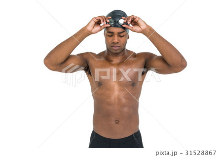 Swimmer holding goggles 31528867