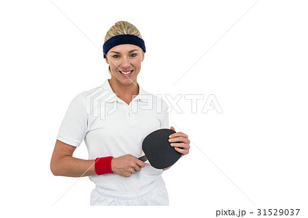 Female athlete holding table tennis paddle Female athlete holding table tennis paddle 31529037