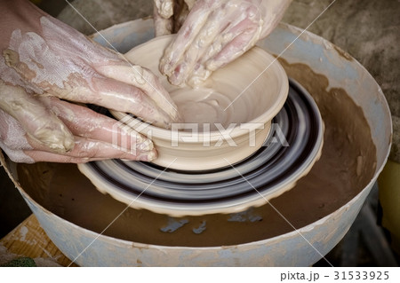 Master class on modeling of clay on potter's wheel Master class on modeling of clay on potter's wheel 31533925