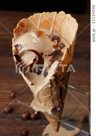 Ice cream in waffle cone Ice cream in waffle cone 31534540