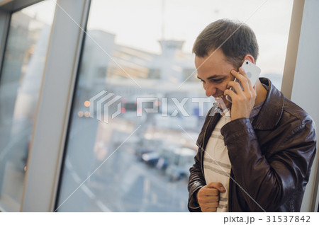 Gonna be home soon. Portrait of a handsome young 31537842