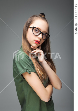 young girl with trendy glasses 31538715
