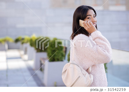 Active emotional lady talking to someone on the Active emotional lady talking to someone on the 31542259