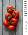 Group of ripe tomatoes 31542663