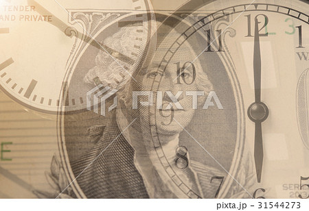 time is money. Double exposure clock and dollar. time is money. Double exposure clock and dollar. 31544273