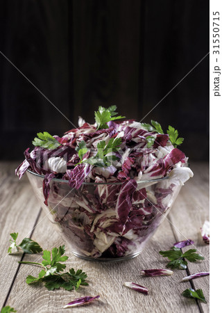 Salad of red cabbage with parsley in a transparent Salad of red cabbage with parsley in a transparent 31550715