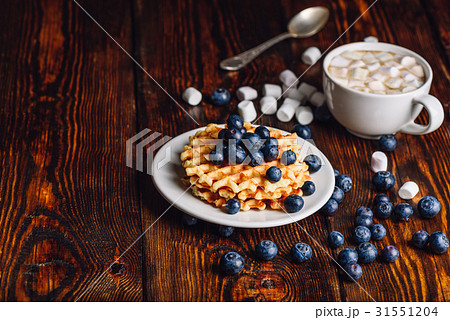 Waffles with Blueberry and Hot Chocolate. Waffles with Blueberry and Hot Chocolate. 31551204