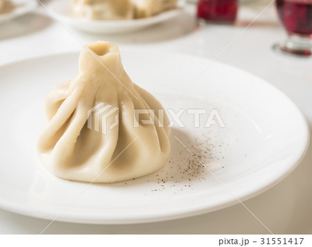 Dumplings Khinkali, manti, pozi, buuzi, poses Dumplings Khinkali, manti, pozi, buuzi, poses 31551417